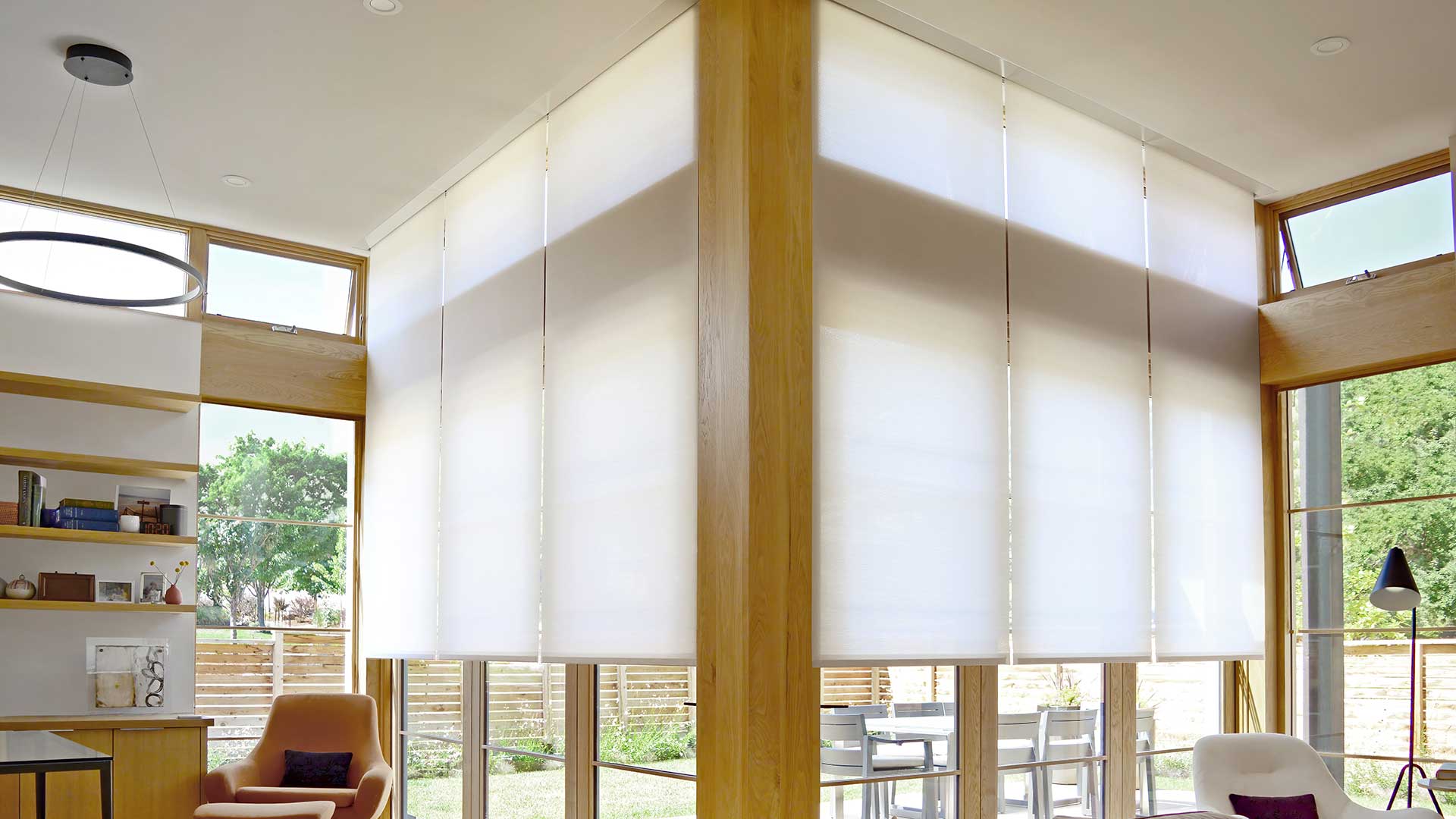 Room darkening roller shade daytime privacy