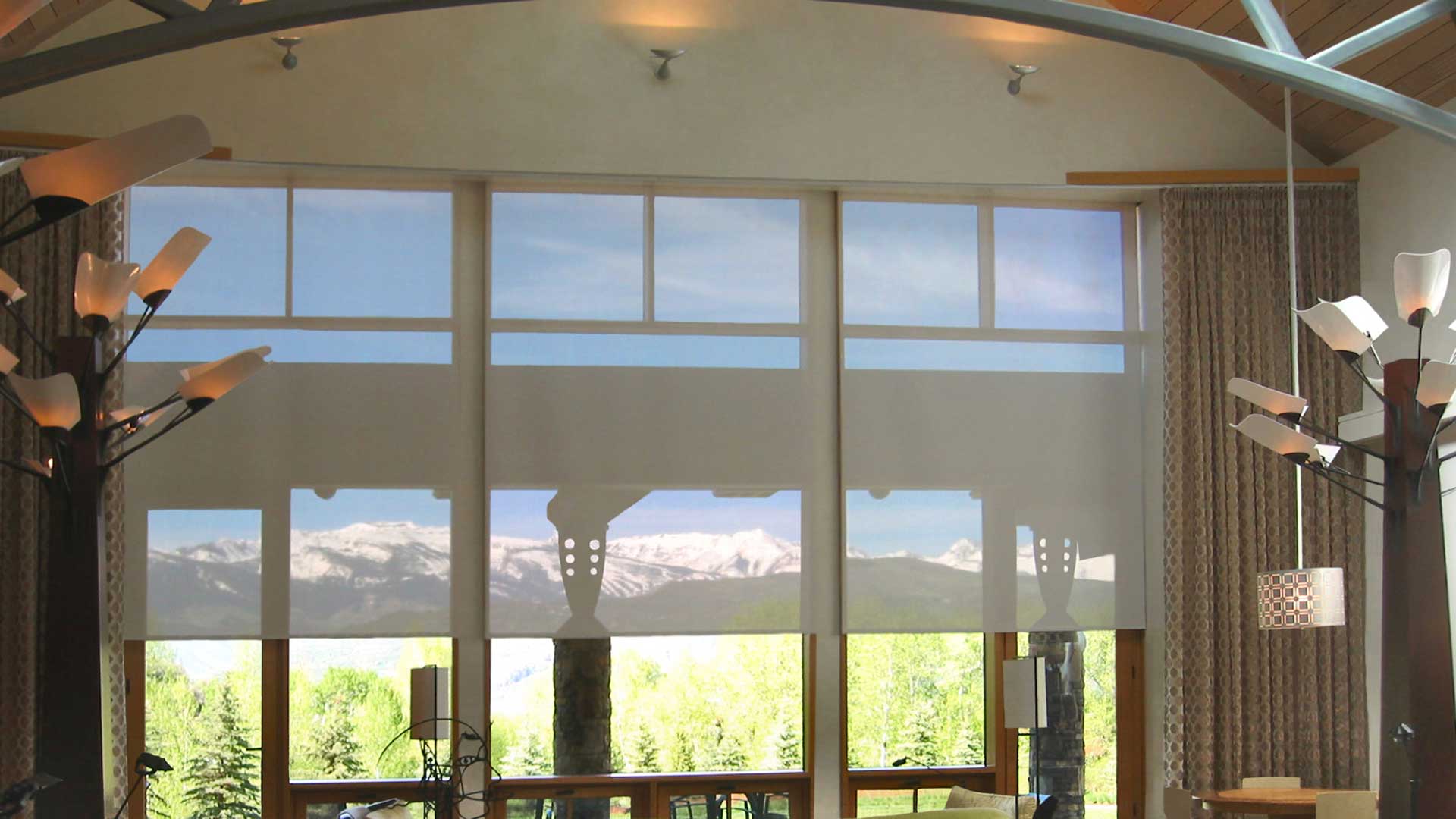 View-through dark fabric solar roller shade